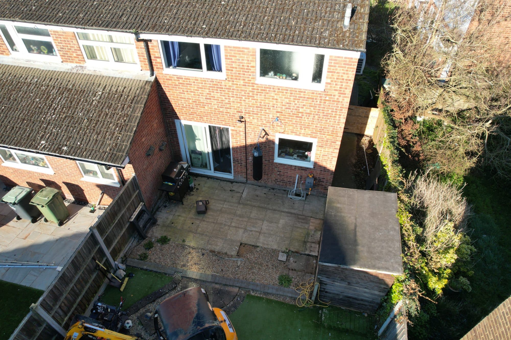 Aerial view of the rear of a terraced house showing the garden and neighbouring boundaries